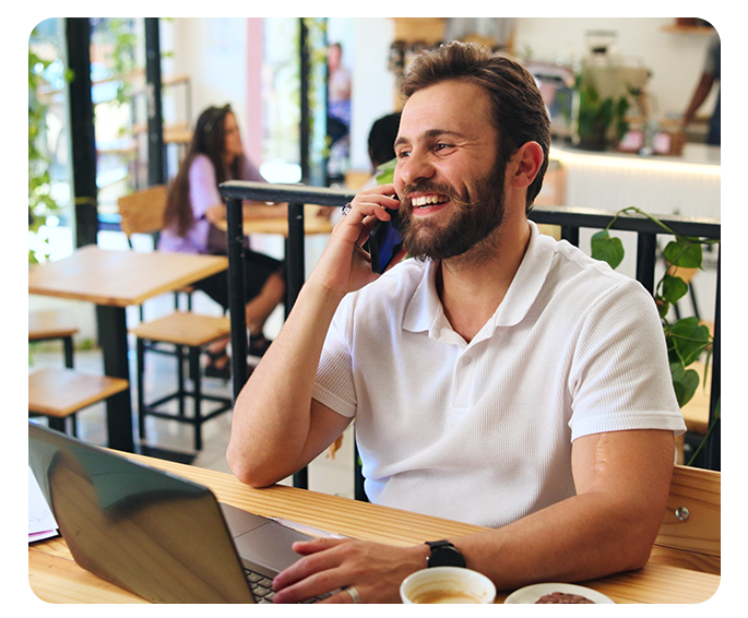 Man on Laptop at cafe